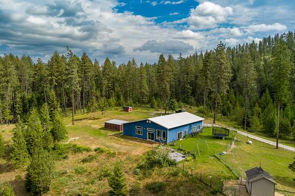 11.8 Acres of Land with Home for Sale in Chewelah, Washington