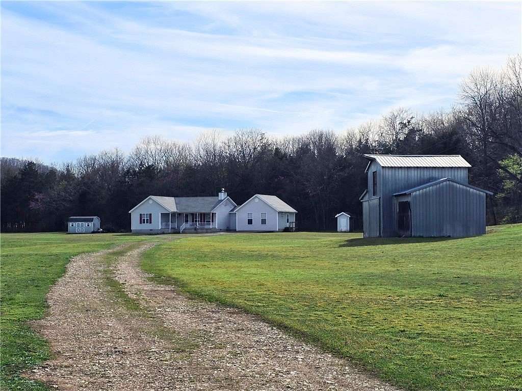 6 Acres of Land with Home for Sale in Green Forest, Arkansas