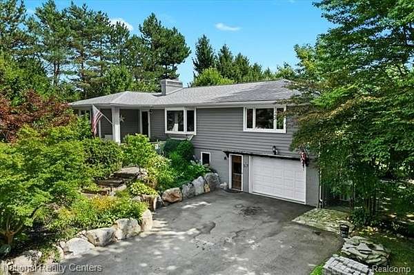 2.78 Acres of Land with Home for Sale in Highland Township, Michigan