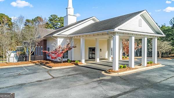 7.75 Acres of Improved Commercial Land for Sale in Snellville, Georgia