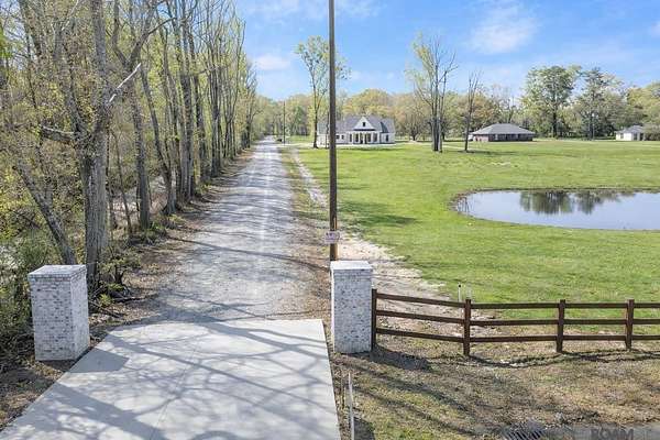 1.79 Acres of Land with Home for Sale in Baker, Louisiana