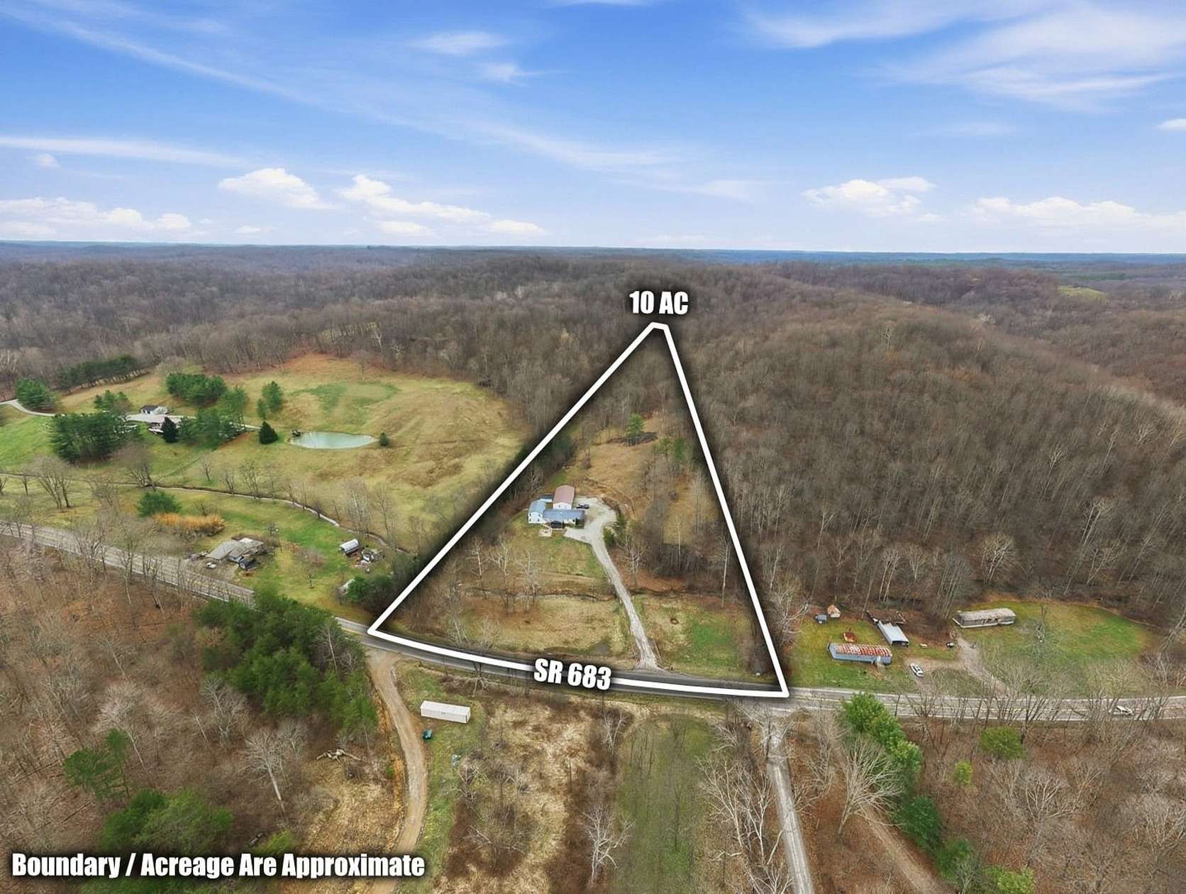 10 Acres of Recreational Land with Home for Sale in McArthur, Ohio