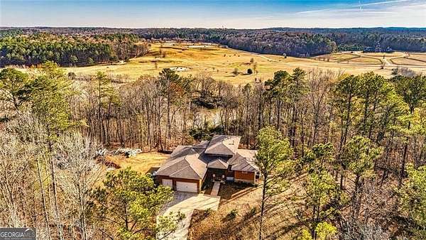7.7 Acres of Land with Home for Sale in Douglasville, Georgia