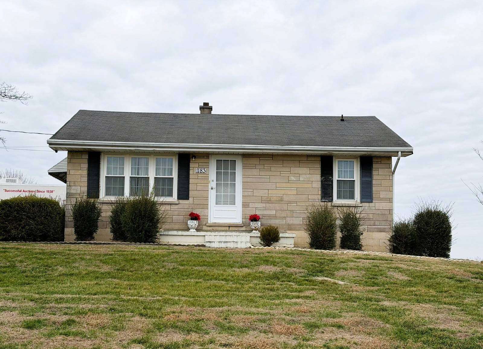 3.27 Acres of Land with Home for Auction in Campbellsville, Kentucky