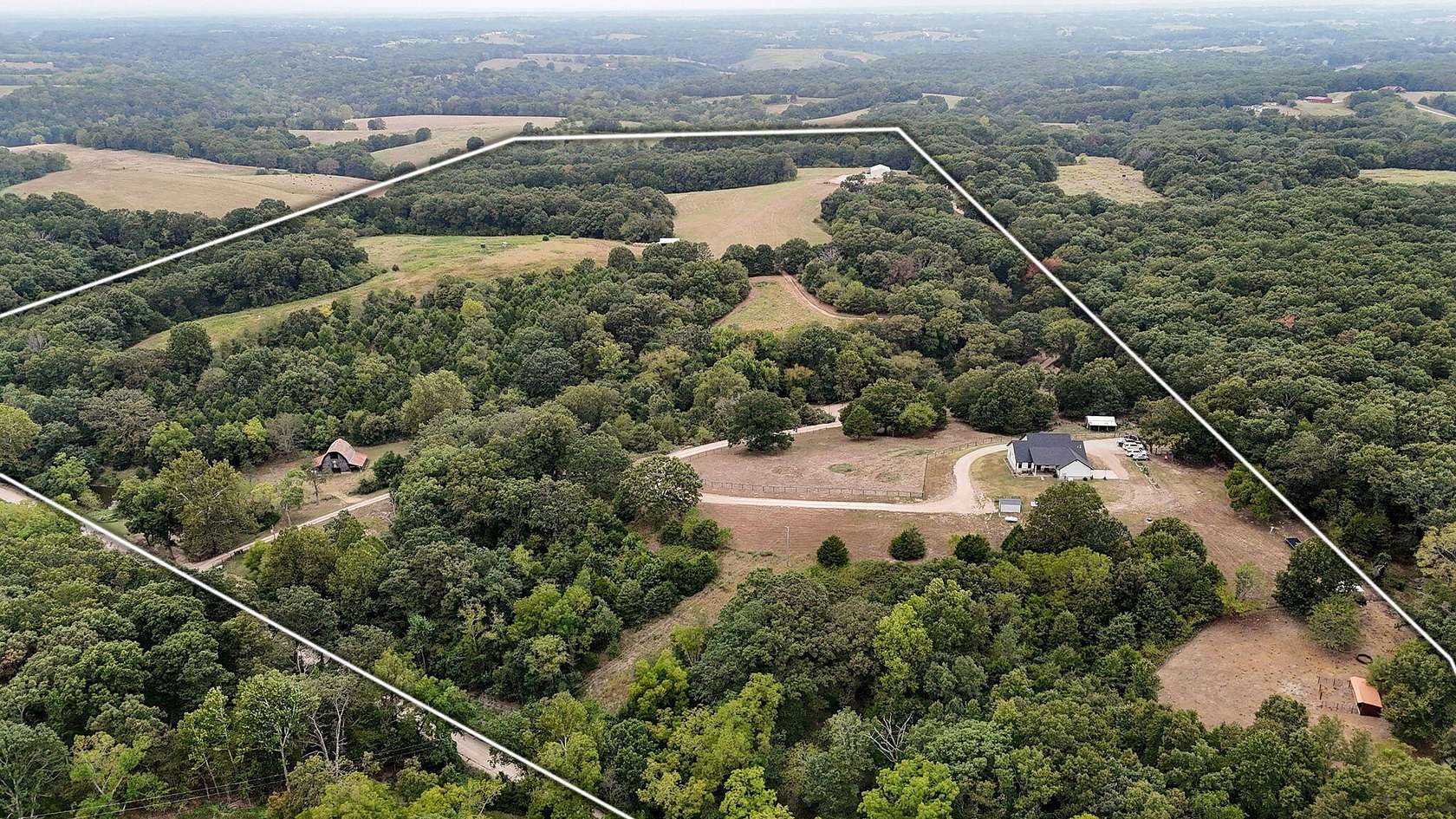 60.6 Acres of Land with Home for Sale in Clever, Missouri