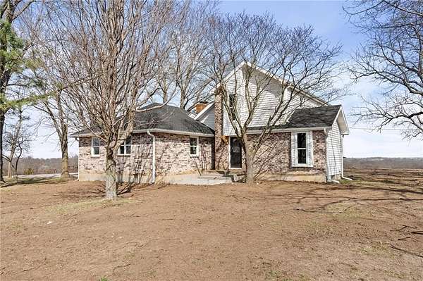 6.3 Acres of Land with Home for Sale in Centerview, Missouri