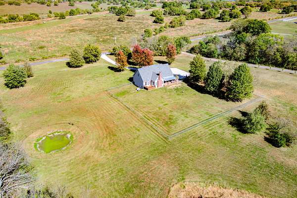 8.4 Acres of Land with Home for Sale in Belton, Missouri