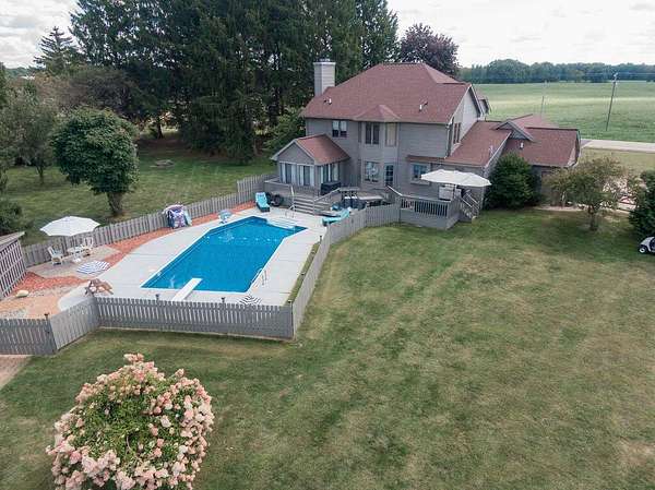 2 Acres of Land with Home for Sale in East Leroy, Michigan