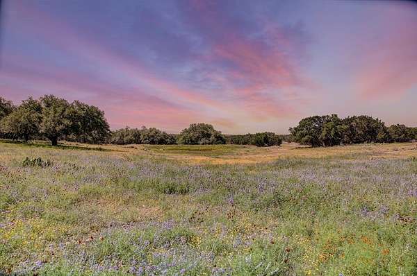 125 Acres of Recreational Land with Home for Sale in Hunt, Texas