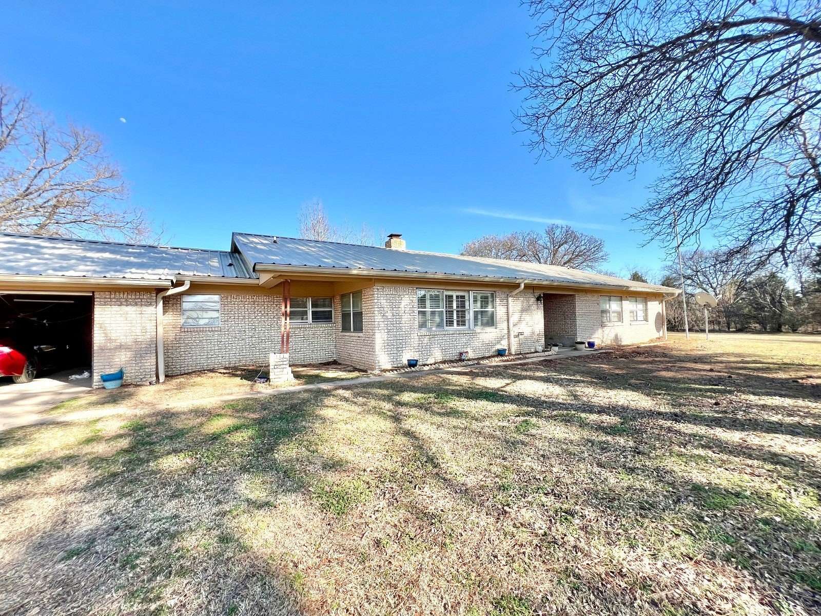 9 Acres of Land with Home for Sale in Milburn, Oklahoma