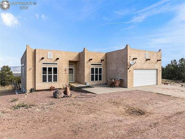 35.8 Acres of Agricultural Land with Home for Sale in Florence, Colorado