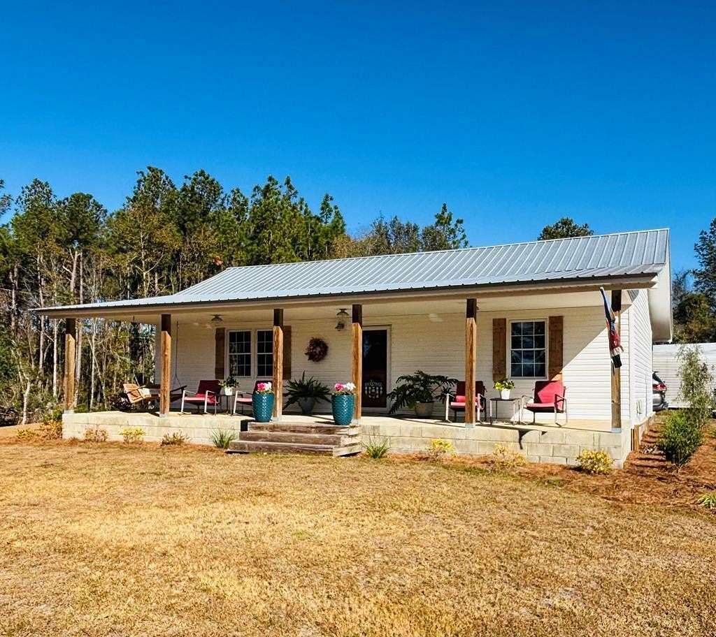 30.3 Acres of Recreational Land with Home for Sale in Collins, Georgia