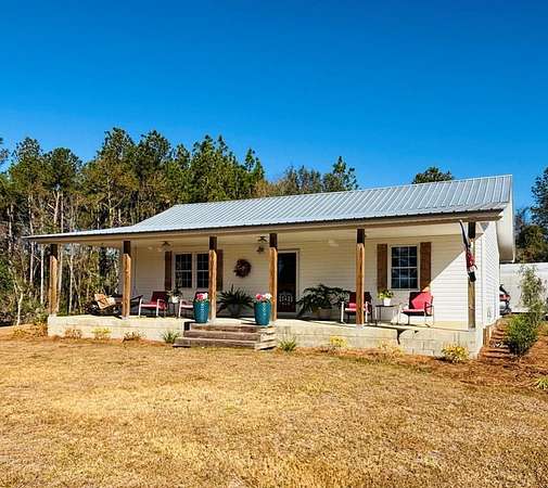 30.3 Acres of Recreational Land with Home for Sale in Collins, Georgia