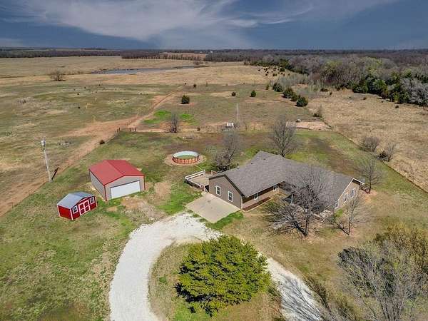 4.83 Acres of Land with Home for Sale in Arkansas City, Kansas