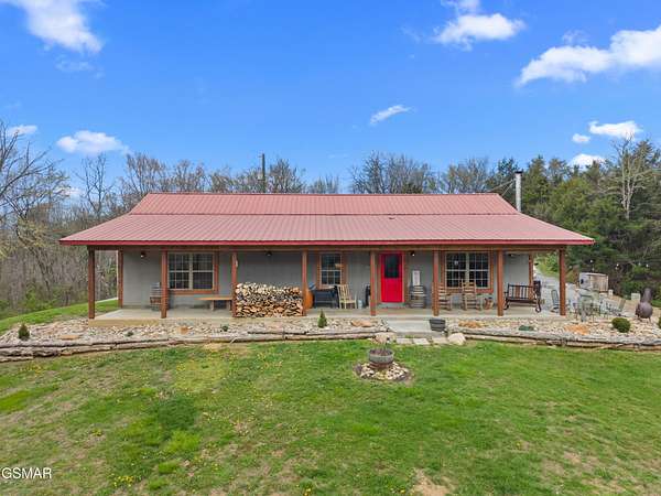 27.3 Acres of Land with Home for Sale in Dandridge, Tennessee