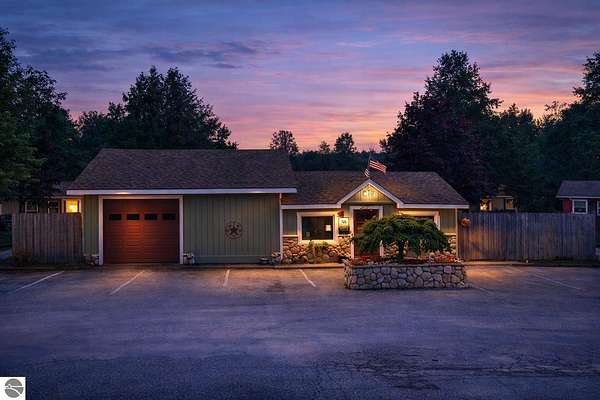 5 Acres of Improved Mixed-Use Land for Sale in Honor, Michigan