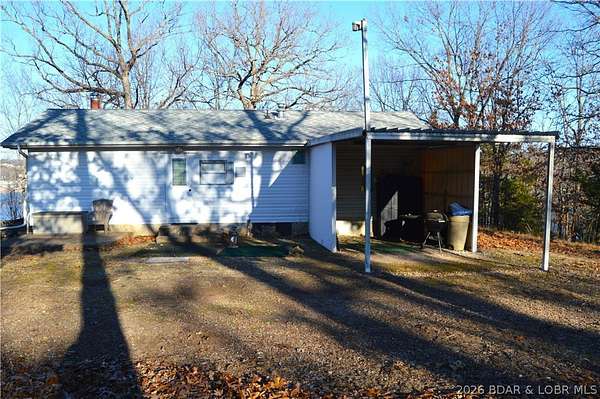 2.4 Acres of Land with Home for Sale in Linn Creek, Missouri