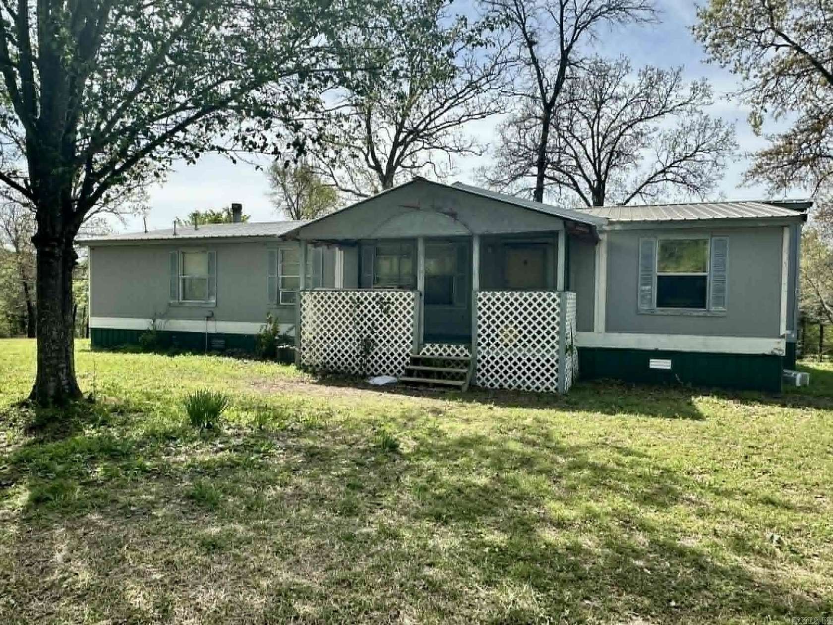 2.39 Acres of Land with Home for Sale in Cove, Arkansas