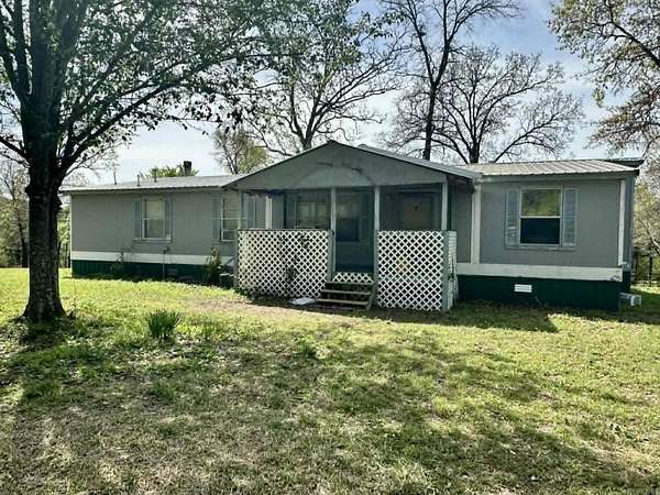 2.39 Acres of Land with Home for Sale in Cove, Arkansas