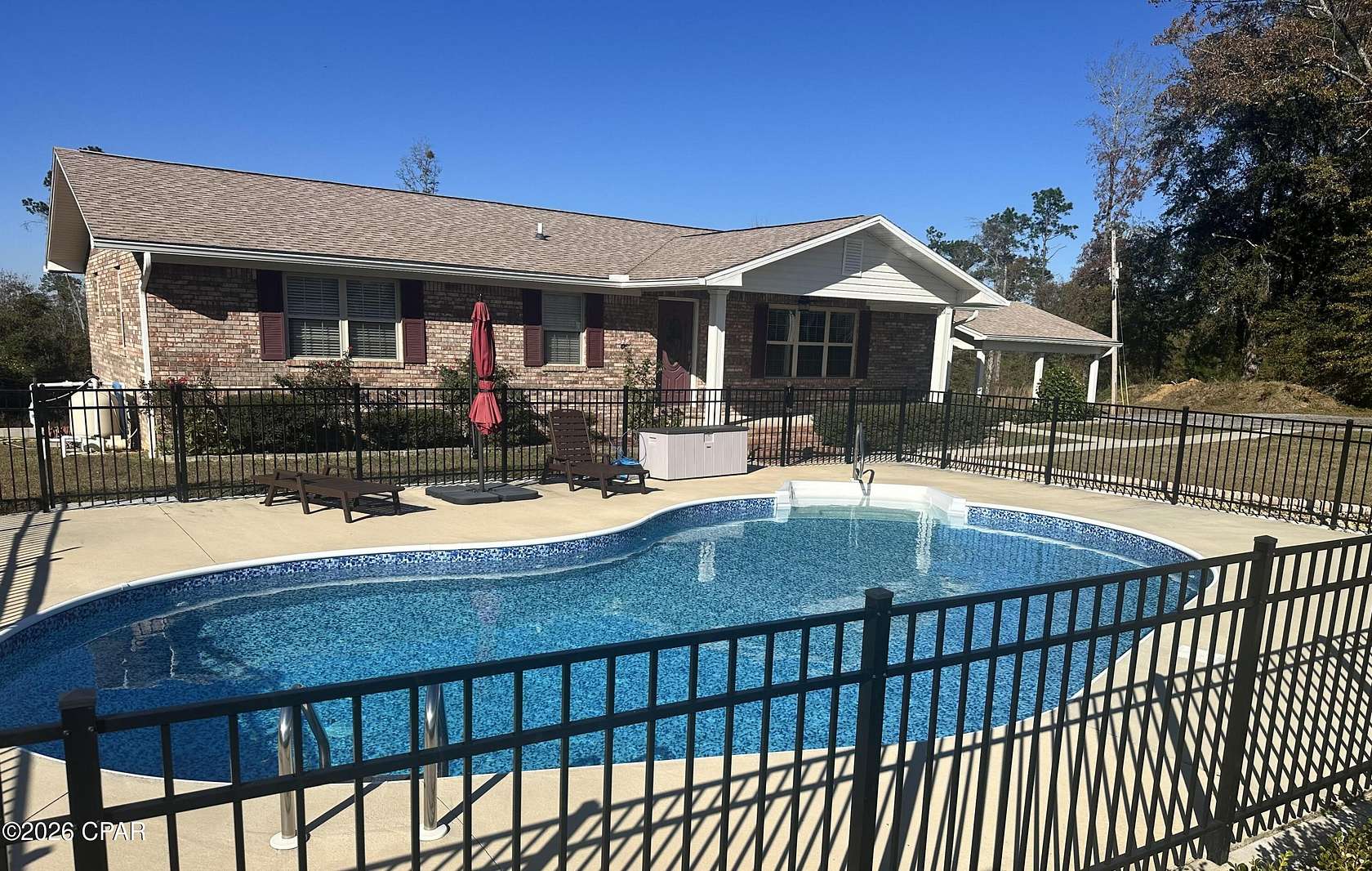 1.73 Acres of Land with Home for Sale in Grand Ridge, Florida