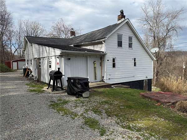 11.7 Acres of Land with Home for Sale in Rices Landing, Pennsylvania