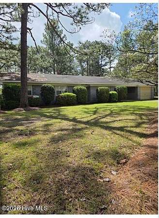 1.79 Acres of Land with Home for Sale in West End, North Carolina