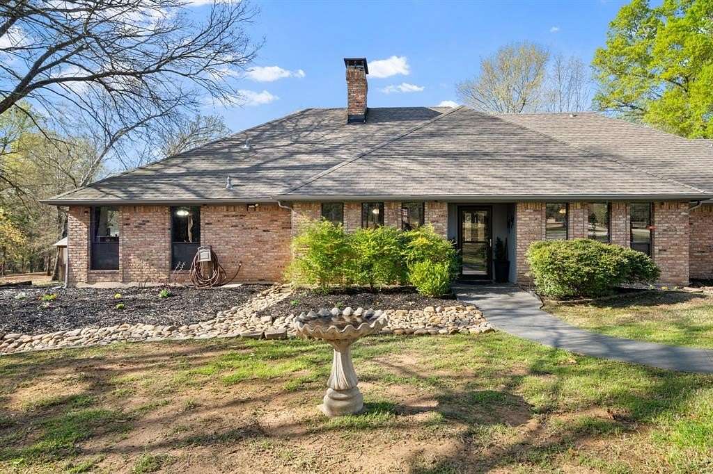 5 Acres of Land with Home for Sale in Paris, Texas