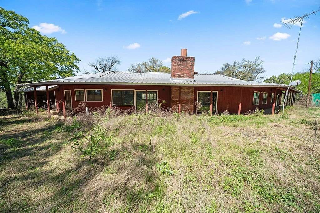 14.3 Acres of Land with Home for Sale in Palestine, Texas