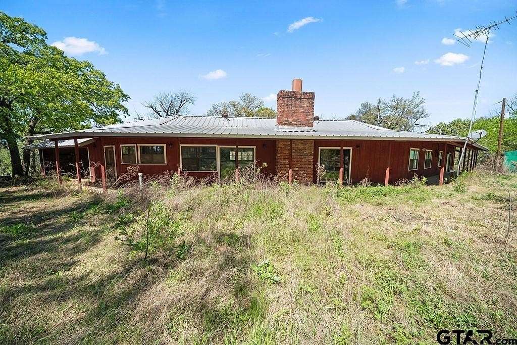 14.3 Acres of Land with Home for Sale in Palestine, Texas
