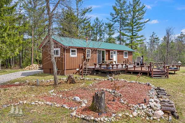 10 Acres of Recreational Land with Home for Sale in Lewiston, Michigan