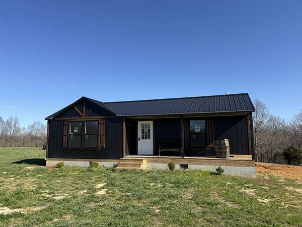 0.5 Acres of Land with Home for Sale in Russell Springs, Kentucky