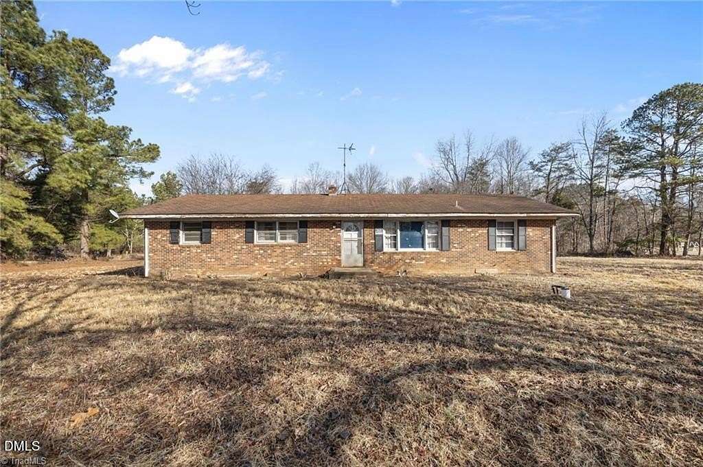 1.5 Acres of Land with Home for Sale in Gibsonville, North Carolina