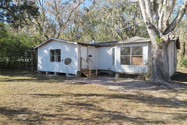 1.5 Acres of Land with Home for Auction in Sanderson, Florida