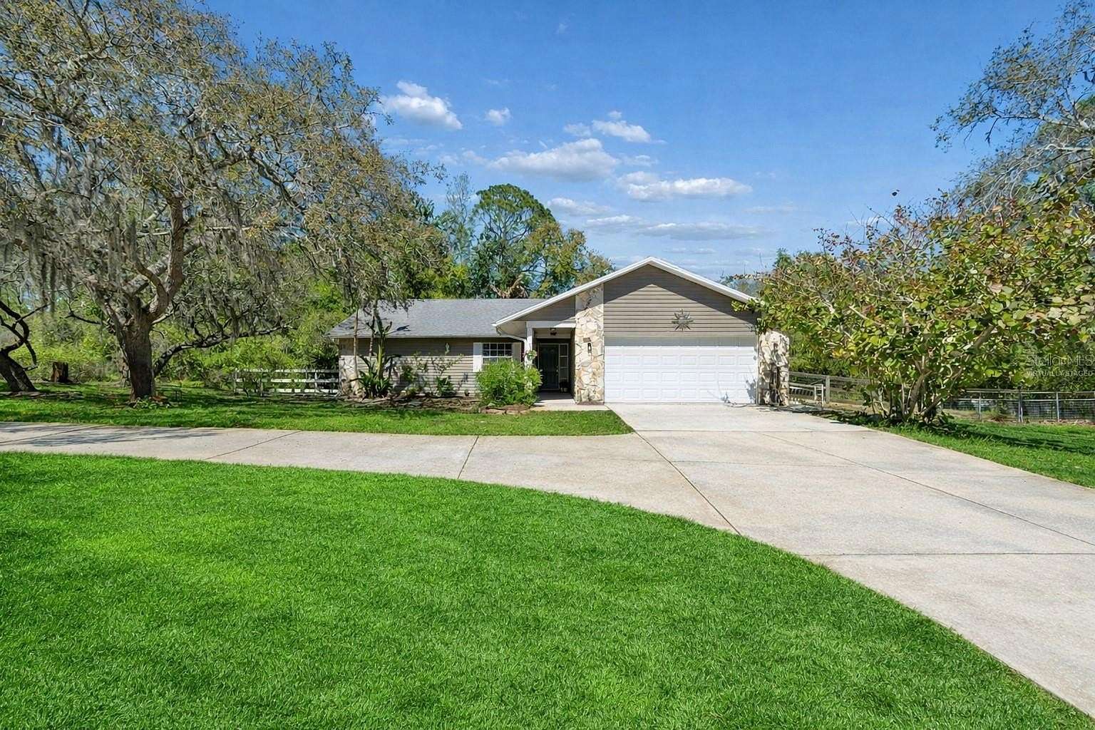 1.55 Acres of Land with Home for Sale in New Port Richey, Florida