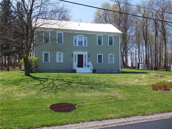 6.49 Acres of Land with Home for Sale in Lansing, New York
