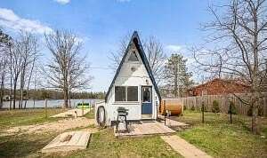 0.59 Acres of Land with Home for Sale in Bitely, Michigan