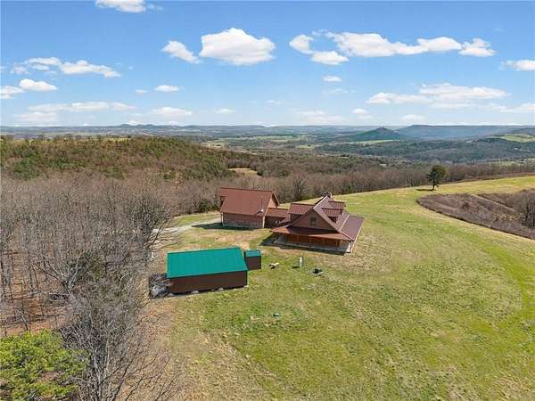 138 Acres of Recreational Land with Home for Sale in Eureka Springs, Arkansas