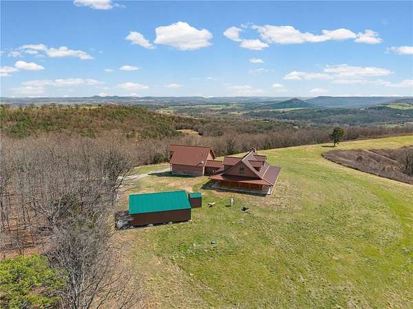138 Acres of Recreational Land with Home for Sale in Eureka Springs, Arkansas