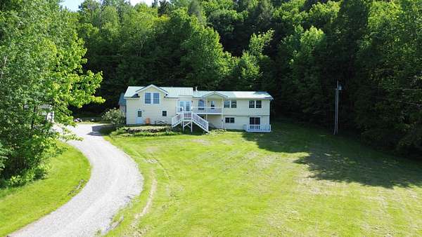 5 Acres of Land with Home for Sale in Huntington, Vermont