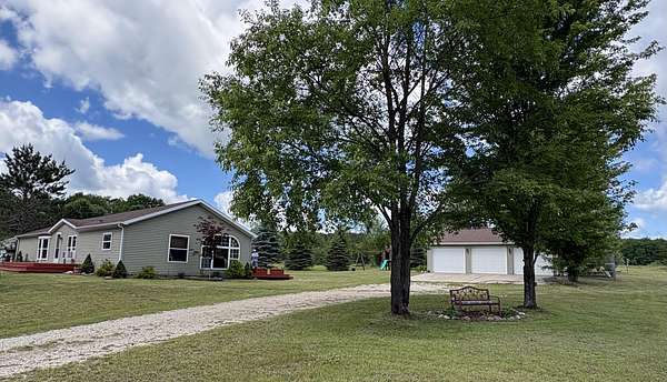 14.4 Acres of Land with Home for Sale in Luther, Michigan