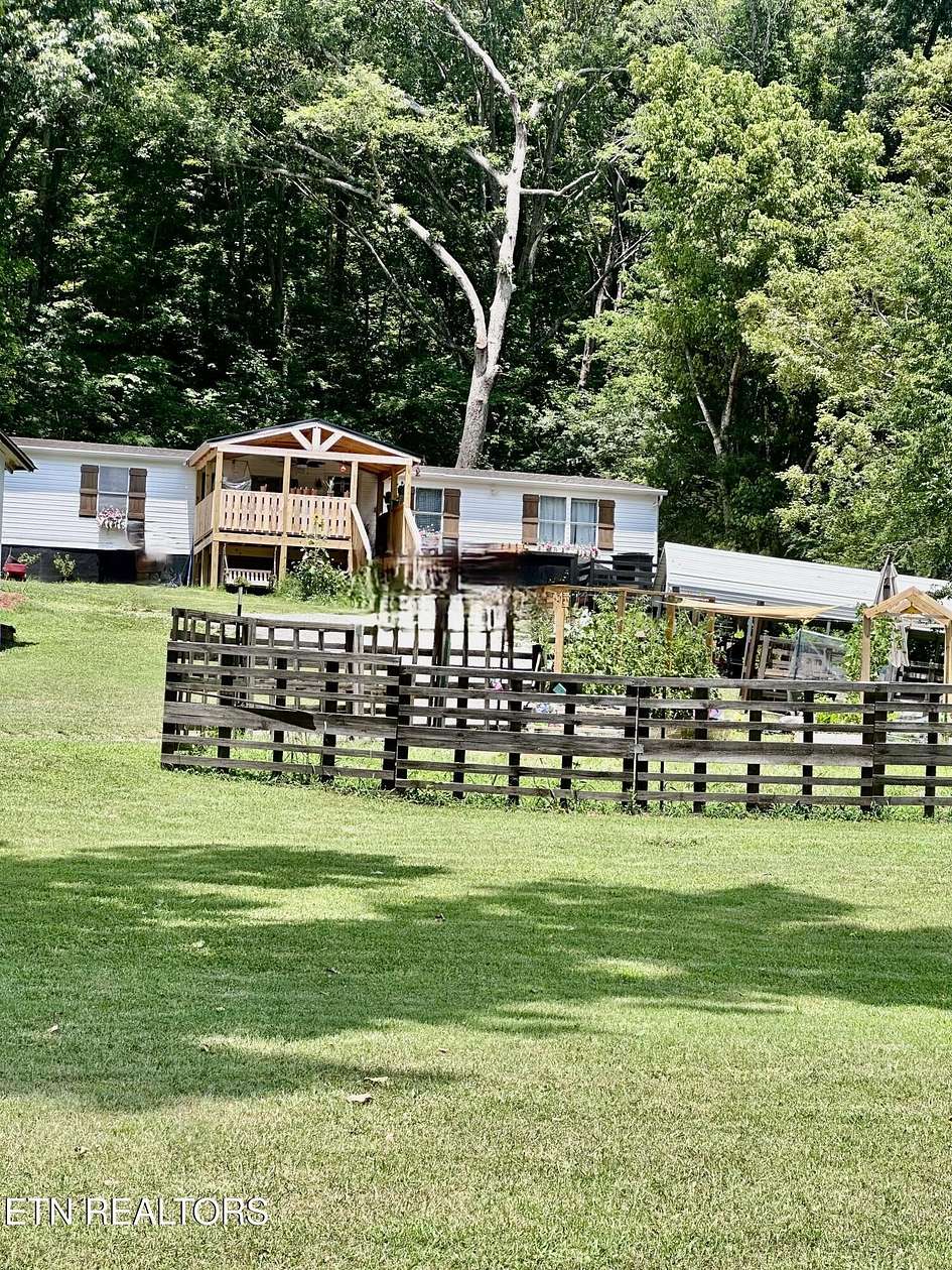 2.3 Acres of Land with Home for Sale in Strawberry Plains, Tennessee