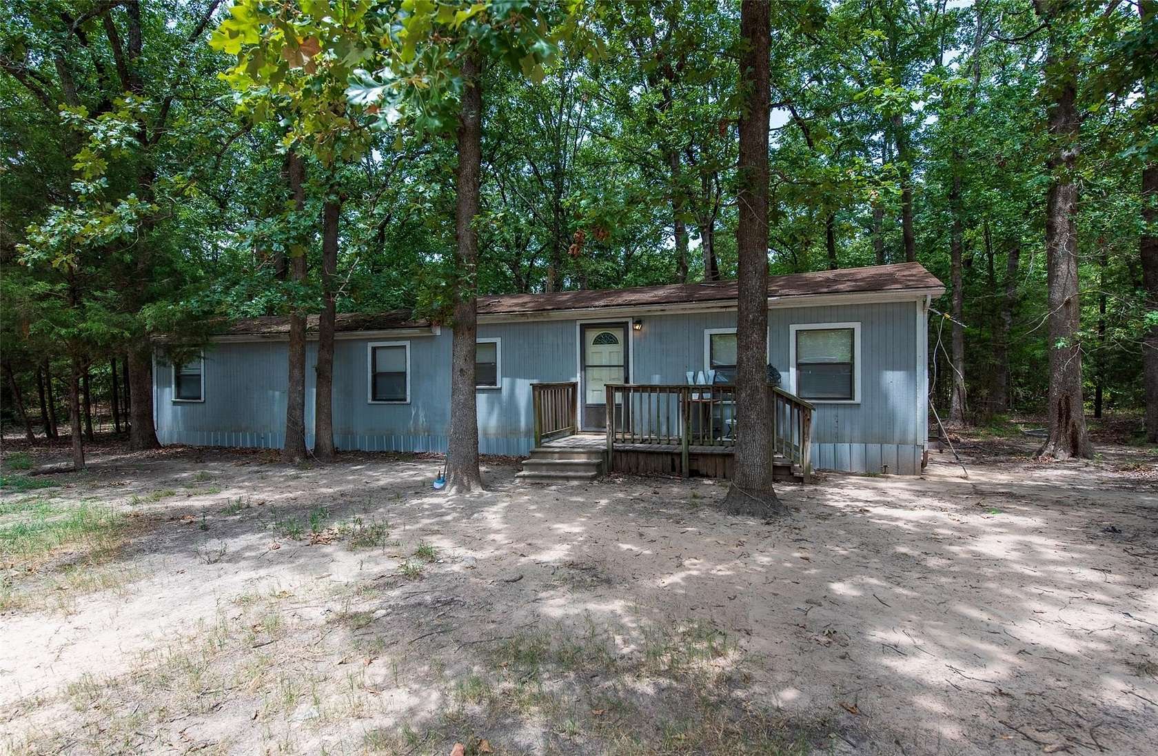 11.6 Acres of Recreational Land with Home for Sale in Paris, Texas