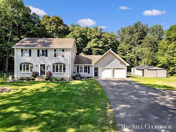 3.5 Acres of Land with Home for Sale in Kent City, Michigan