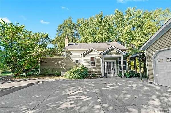 2.5 Acres of Land with Home for Sale in Clarkston, Michigan