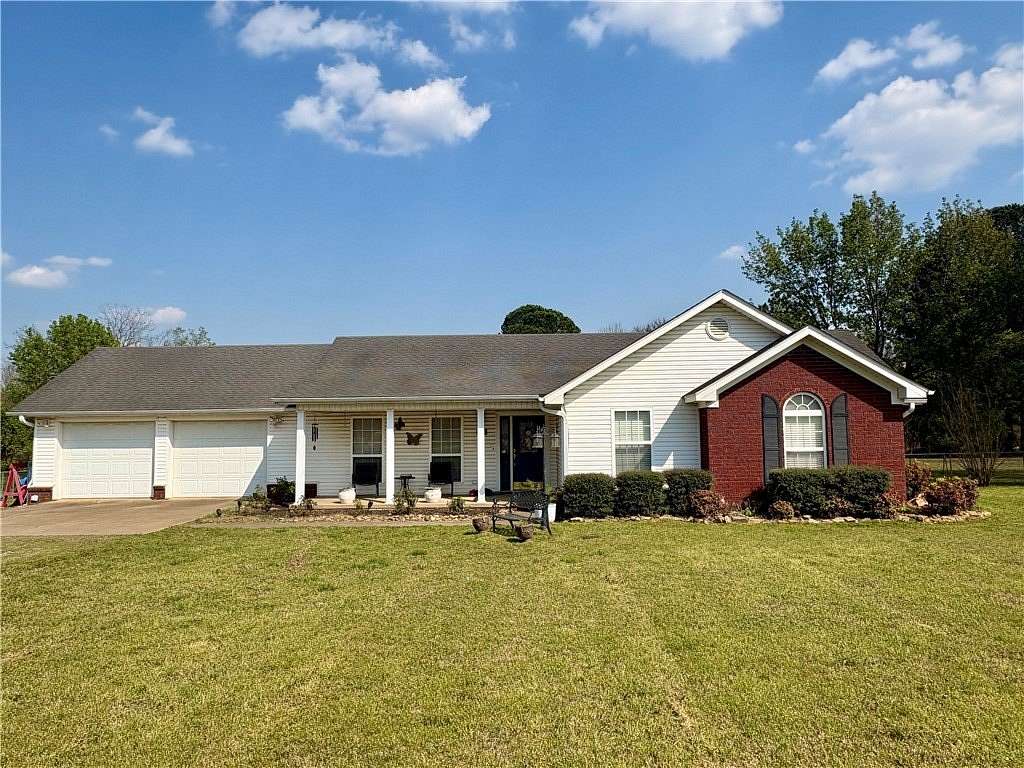 1.27 Acres of Land with Home for Sale in Dardanelle, Arkansas