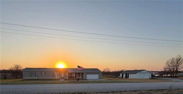 10.1 Acres of Land with Home for Sale in Holden, Missouri