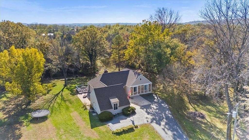 5 Acres of Land with Home for Sale in Oak Grove, Missouri