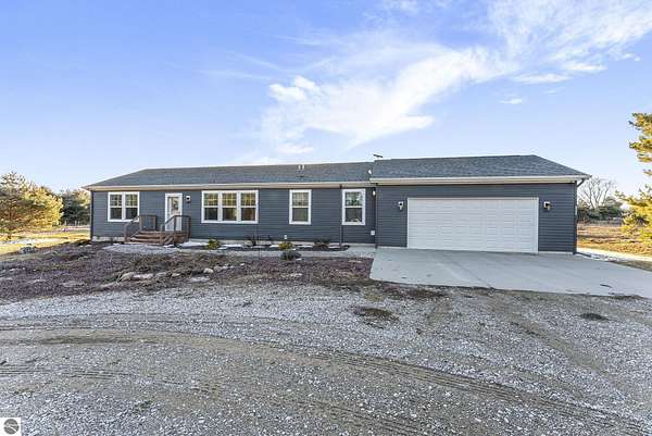 6.75 Acres of Land with Home for Sale in Cadillac, Michigan