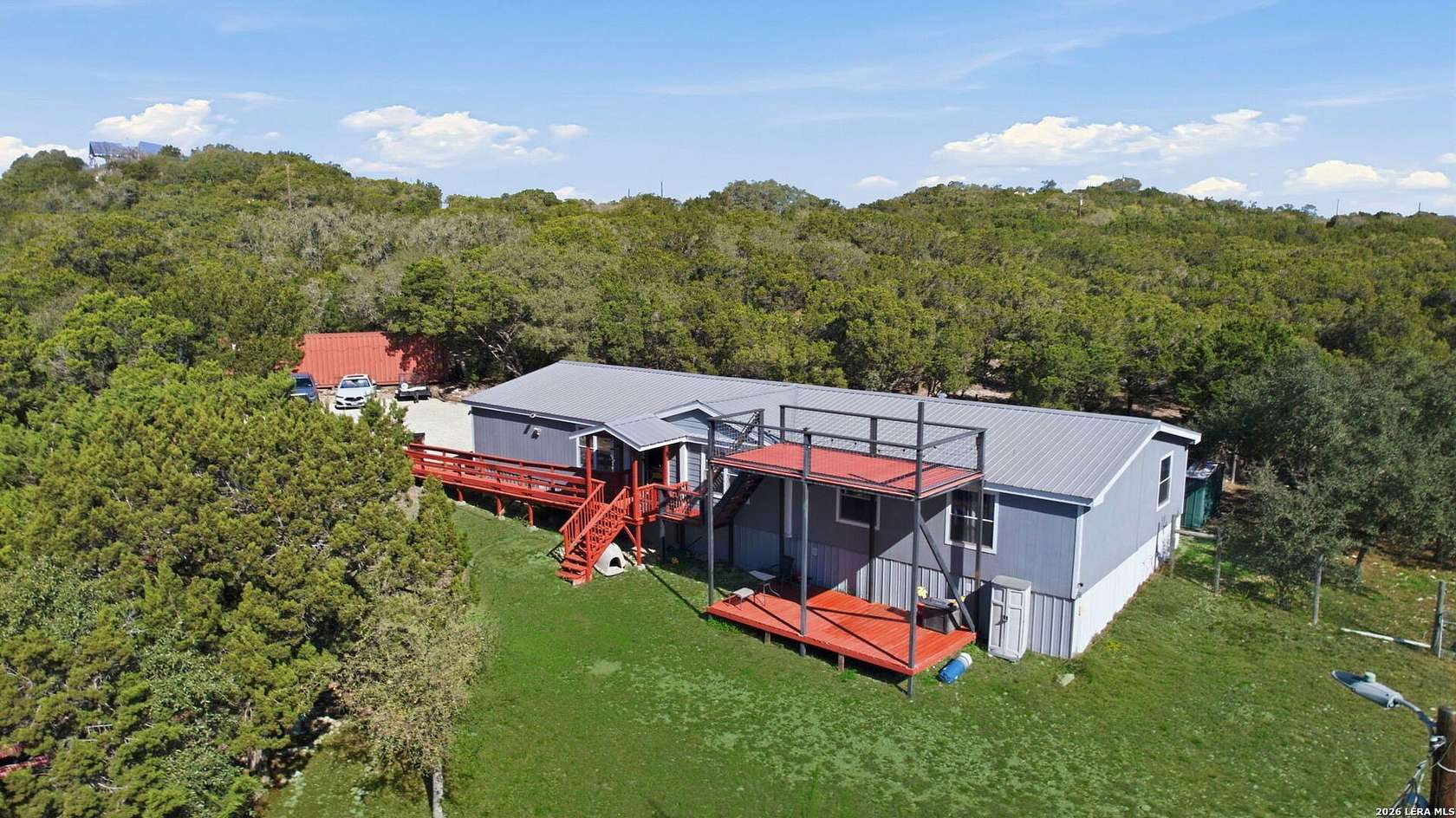 9.4 Acres of Land with Home for Sale in Lakehills, Texas