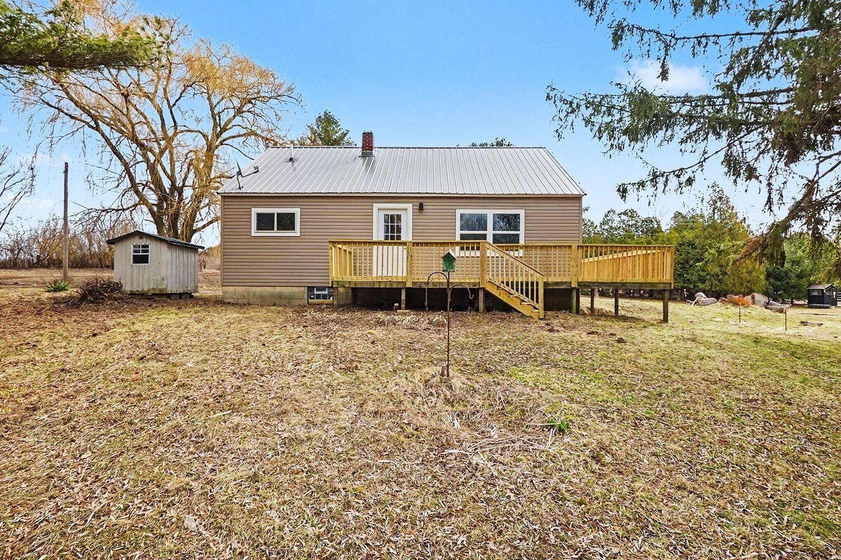 2 Acres of Land with Home for Sale in Coral, Michigan